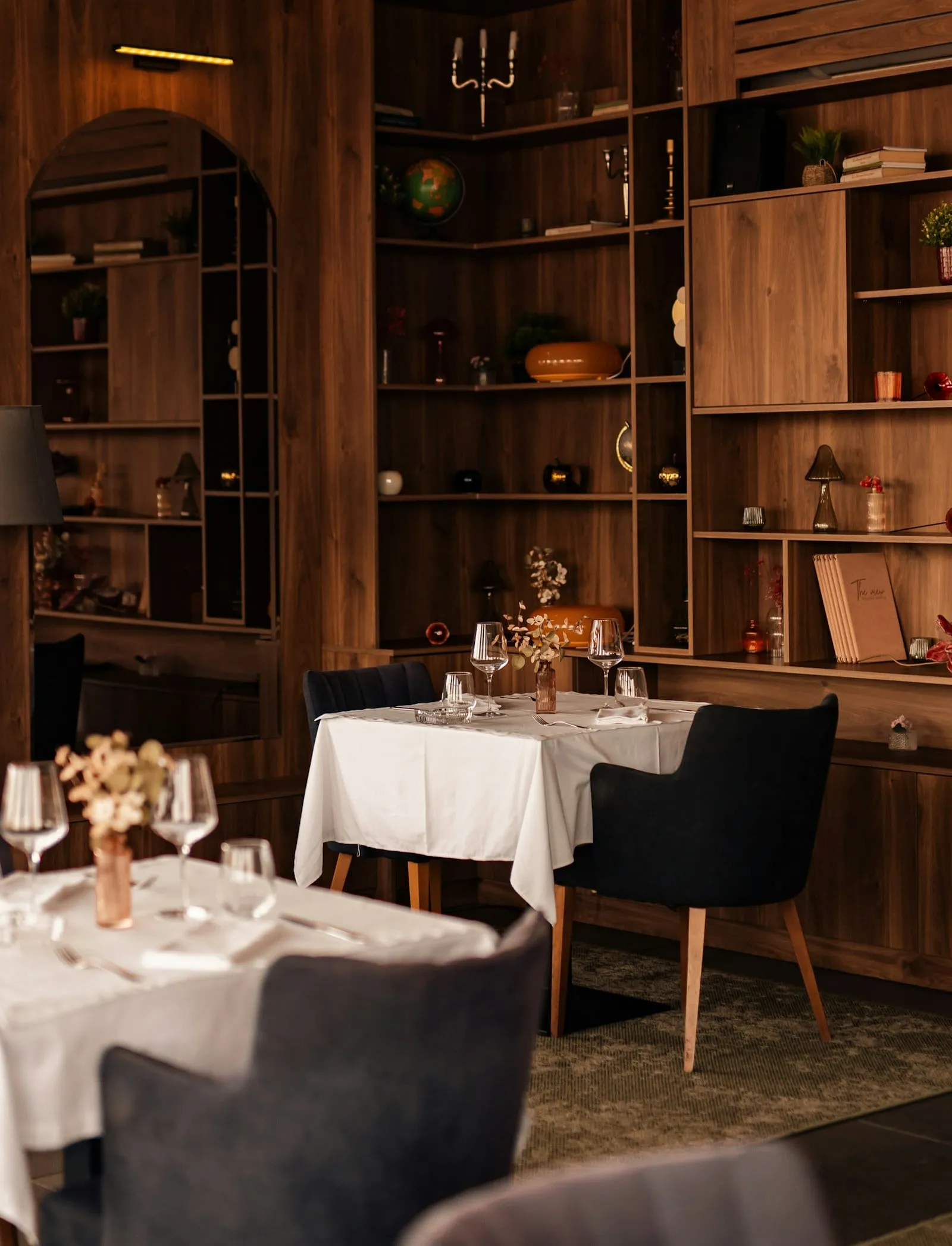 The private dining room lined with wooden bookshelves