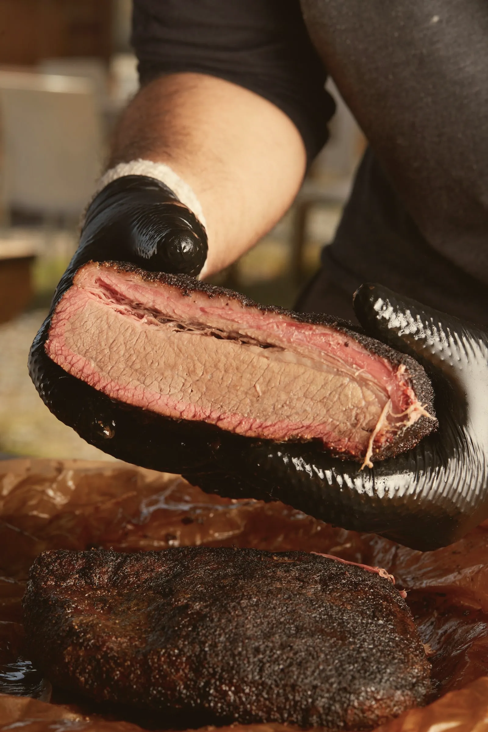 A thick slice of smoked brisket