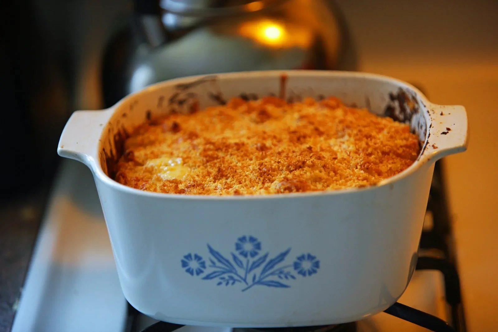 Baked macaroni and cheese in a white casserole dish