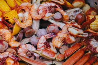 A low country boil of shrimp, crab, sausage and corn