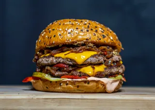 A double smash burger with melted cheese