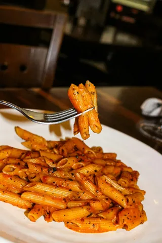 Penne in a creamy tomato sauce